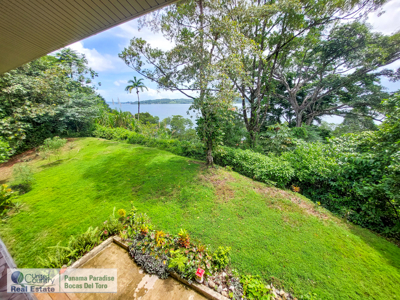 Titled Waterfront Home with Elevated Sea Views and Breezes - image 21