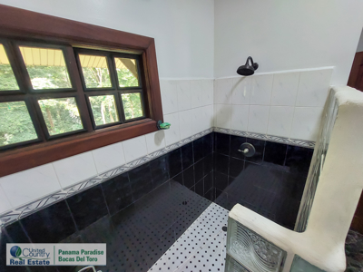 Titled Waterfront Home with Elevated Sea Views and Breezes - image 17