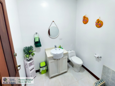 Titled Waterfront Home with Elevated Sea Views and Breezes - image 9