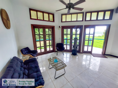 Titled Waterfront Home with Elevated Sea Views and Breezes - image 12