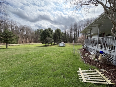 Beallsville OH Ranch home on 26 +/- Acres with buildings and pond - image 6