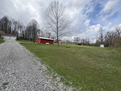 Beallsville OH Ranch home on 26 +/- Acres with buildings and pond - image 2