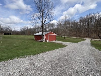 Beallsville OH Ranch home on 26 +/- Acres with buildings and pond - image 5