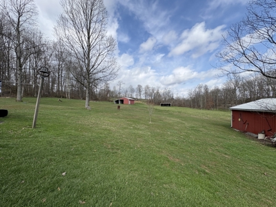 Beallsville OH Ranch home on 26 +/- Acres with buildings and pond - image 4