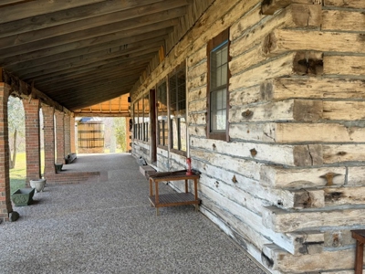 A Rare Riverfront Log Cabin Retreat in Butte La Rose - image 10