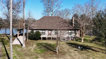 A Rare Riverfront Log Cabin Retreat in Butte La Rose - image 5