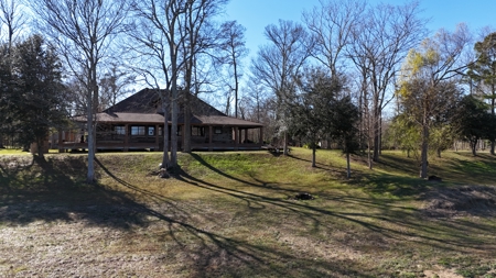 A Rare Riverfront Log Cabin Retreat in Butte La Rose - image 12