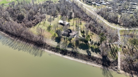 A Rare Riverfront Log Cabin Retreat in Butte La Rose - image 6