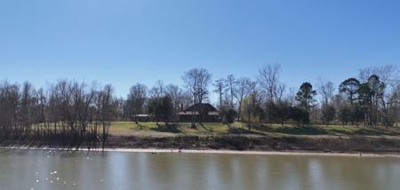 A Rare Riverfront Log Cabin Retreat in Butte La Rose - image 2