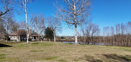 A Rare Riverfront Log Cabin Retreat in Butte La Rose - image 11