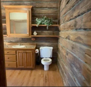 A Rare Riverfront Log Cabin Retreat in Butte La Rose - image 27