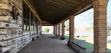 A Rare Riverfront Log Cabin Retreat in Butte La Rose - image 8