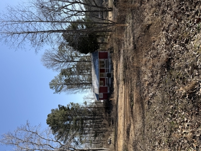 $75K, .77 Acres, Multiple Structures – Your Investment Advantage - image 5