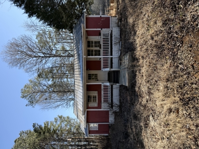 $75K, .77 Acres, Multiple Structures – Your Investment Advantage - image 1