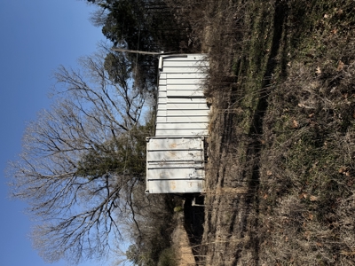 $75K, .77 Acres, Multiple Structures – Your Investment Advantage - image 8