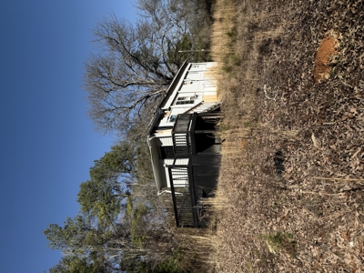 $75K, .77 Acres, Multiple Structures – Your Investment Advantage - image 7