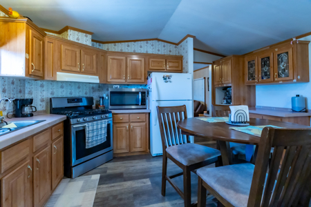 Country Comfort Meets Opportunity on 4.55 Fully Fenced Acres with - image 23