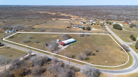 Country Comfort Meets Opportunity on 4.55 Fully Fenced Acres with - image 1