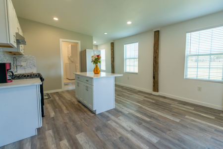 Country Comfort Meets Opportunity on 4.55 Fully Fenced Acres with - image 4