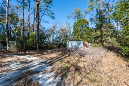 Handyman Special 1.84-Acre Investment Opportunity in Live Oak, FL - image 4