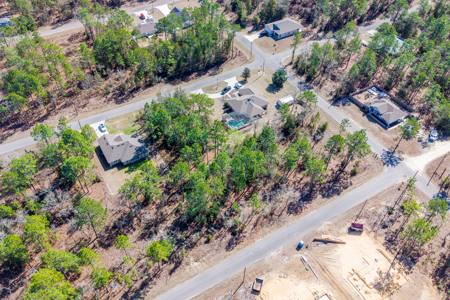 PAVED ROAD LOT in Williston Highlands - image 6