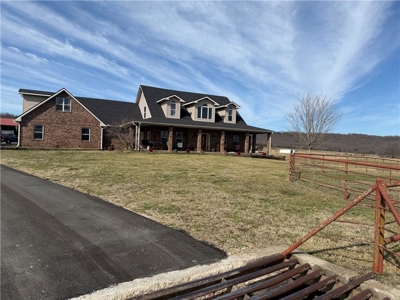 Private Ozark Estate with Spring-Fed Creek & Cattle Operation - image 1