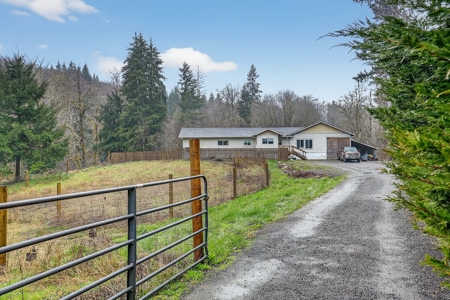 11+ Private Acres with Creek, Shop & Timber - image 1