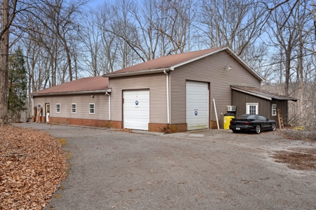 87-Acre Fire Tower Estate: 2 Homes, Lake & 12,014 Sq Ft - image 45