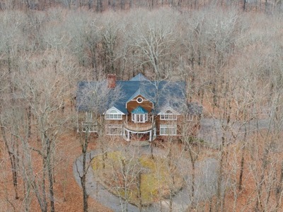 87-Acre Fire Tower Estate: 2 Homes, Lake & 12,014 Sq Ft - image 31