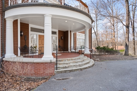 87-Acre Fire Tower Estate: 2 Homes, Lake & 12,014 Sq Ft - image 2