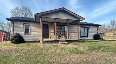 Charming 3BR Ranch with Open Layout, Porch, Deck, & Shed - image 1