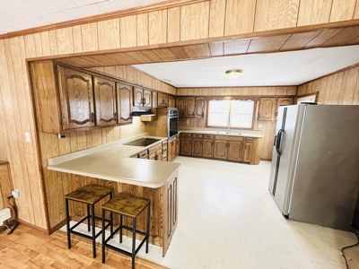Charming 3BR Ranch with Open Layout, Porch, Deck, & Shed - image 2