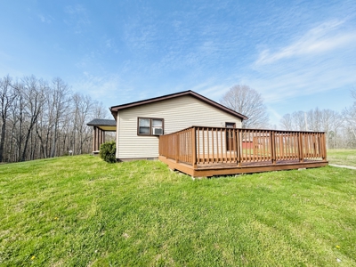 Charming 3BR Ranch with Open Layout, Porch, Deck, & Shed - image 12