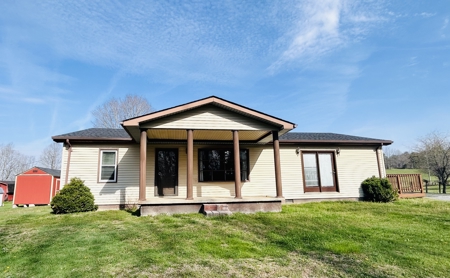 Charming 3BR Ranch with Open Layout, Porch, Deck, & Shed - image 11