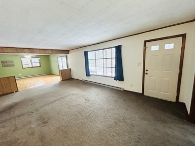 Charming 3BR Ranch with Open Layout, Porch, Deck, & Shed - image 4