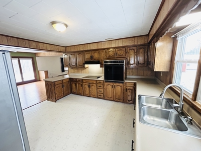 Charming 3BR Ranch with Open Layout, Porch, Deck, & Shed - image 3