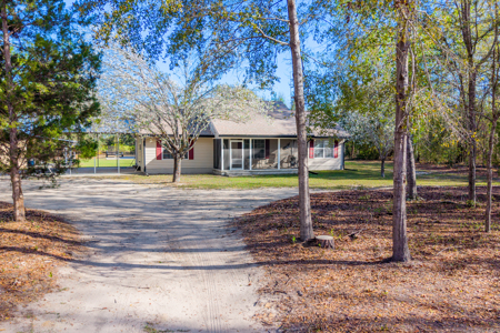 Serene 10-Acre Country Estate with Barndominium in Jennings, FL - image 28