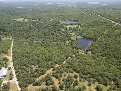 74-Acre Ranch w/ Lakes & Luxury Home in Bowie TX - image 1