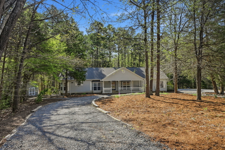 Private Home with Creek + Additional Buildable Lot Available - image 4