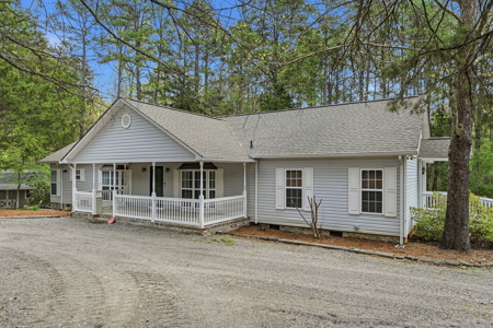 Private Home with Creek + Additional Buildable Lot Available - image 3