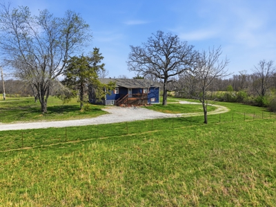 Spacious Country Retreat on 22.6 Acres with Dual Living Potential - image 2