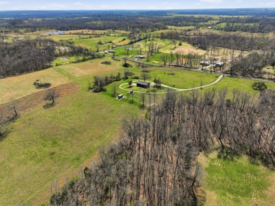 Spacious Country Retreat on 22.6 Acres with Dual Living Potential - image 42