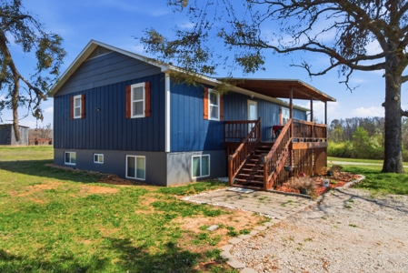 Spacious Country Retreat on 22.6 Acres with Dual Living Potential - image 4