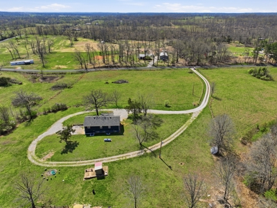 Spacious Country Retreat on 22.6 Acres with Dual Living Potential - image 36