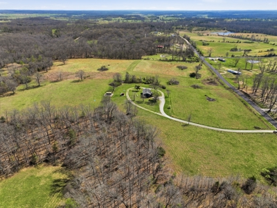 Spacious Country Retreat on 22.6 Acres with Dual Living Potential - image 40