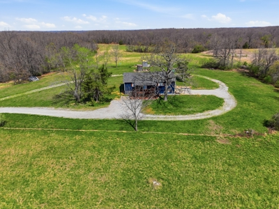 Spacious Country Retreat on 22.6 Acres with Dual Living Potential - image 34