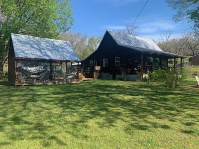 Home With Apartment Loft And Several Outbuildings - image 3
