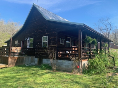 Home With Apartment Loft And Several Outbuildings - image 2