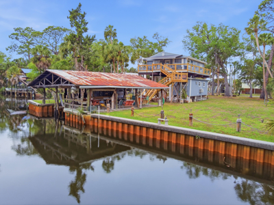 Canal Front Home With Boat House in Suwannee, FL - image 1