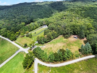 Modern Log Home on 125+ Acres Bordering National Forest - image 21